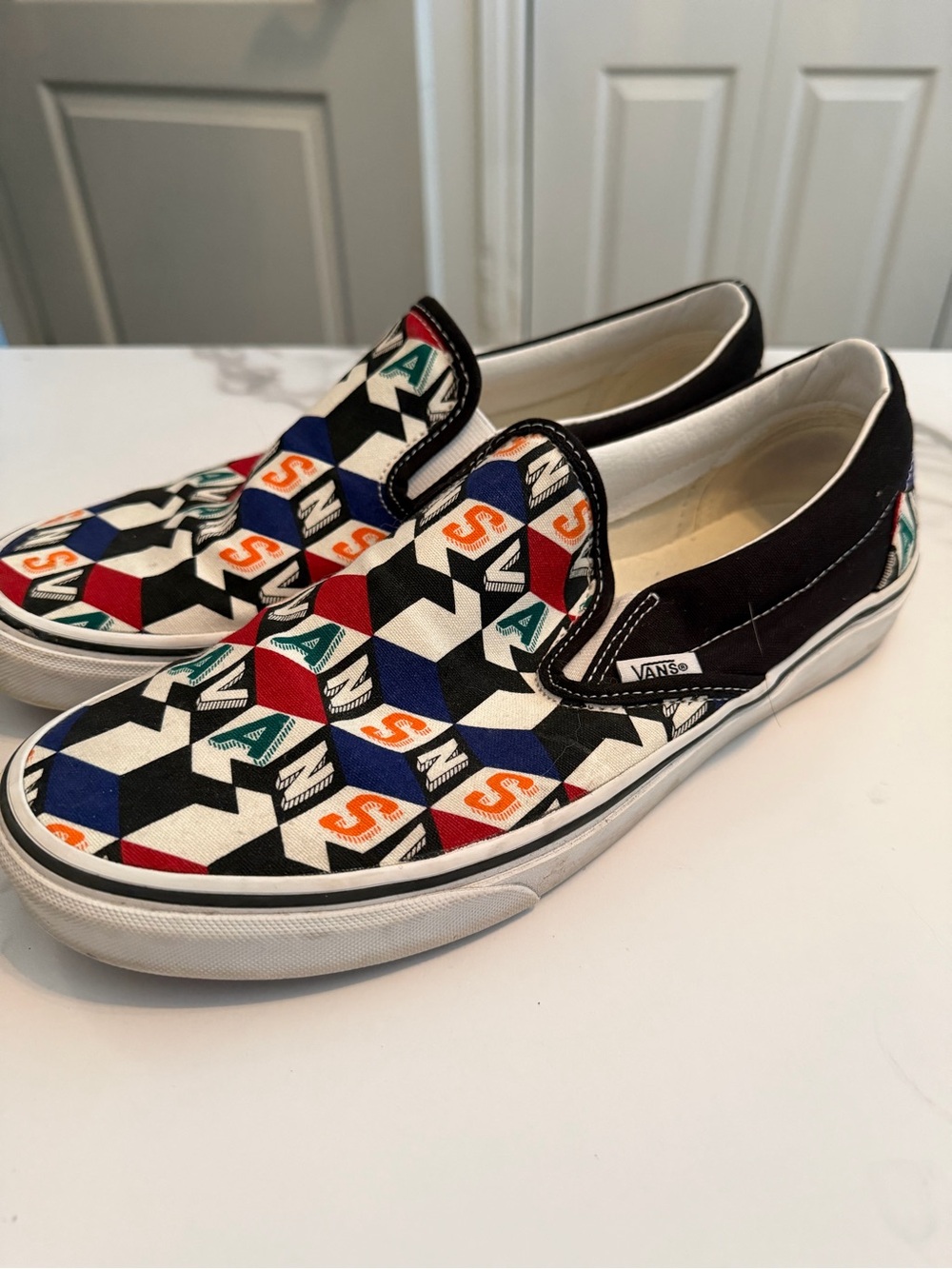 Vans Slip-On Sneakers in Black, Red, Blue, Green, Orange & White